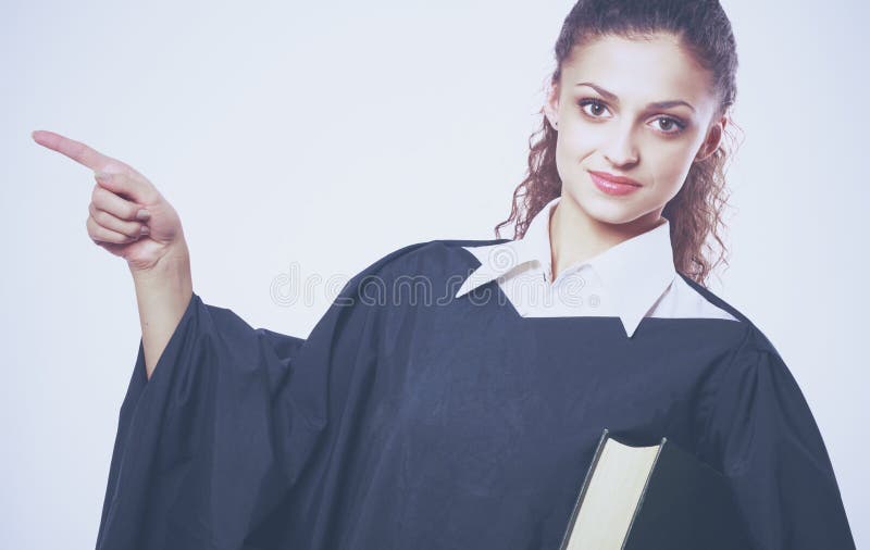 Retrato de un juez femenino joven, aislado en el fondo blanco fotografía de archivo libre de regalías Retrato de un juez femenino joven, aislado en el fondo blanco fotografía de archivo libre de regalías