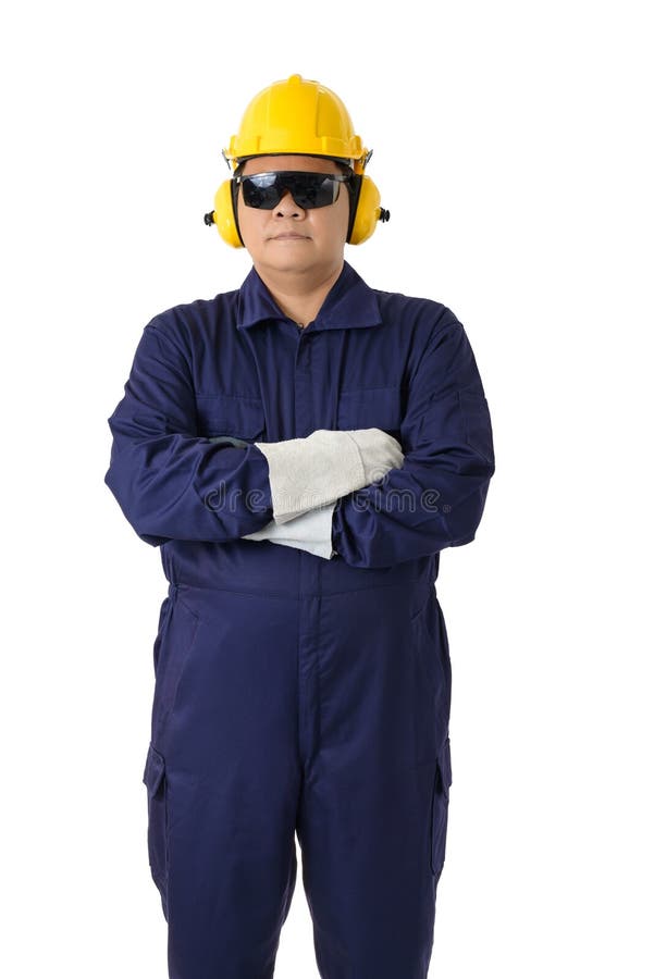 Retrato de un trabajador en el mecánico Jumpsuit con el casco, las orejeras, los guantes protectores y las gafas de seguridad ais fotos de archivo Retrato de un trabajador en el mecánico Jumpsuit con el casco, las orejeras, los guantes protectores y las gafas de seguridad ais fotos de archivo