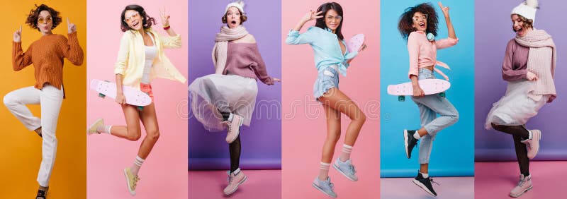 Retrato de una chica despreocupada con pantalones blancos saltando sobre un fondo naranja. mujer romántica con vello ondulado bail imagen de archivo libre de regalías