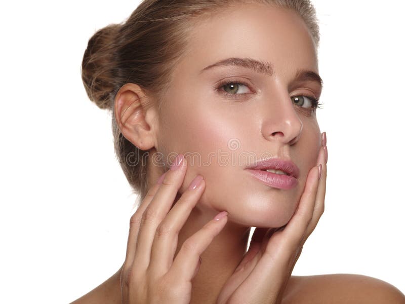 Portrait of a young girl with pure and healthy smooth skin without makeup, who is doing daily cleansing procedures, wellness and spa, white isolated background. Portrait of a young girl with pure and healthy smooth skin without makeup, who is doing daily cleansing procedures, wellness and spa, white isolated background