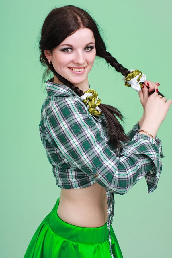 Retrato de una muchacha con las coletas foto de archivo libre de regalías Retrato de una muchacha con las coletas foto de archivo libre de regalías