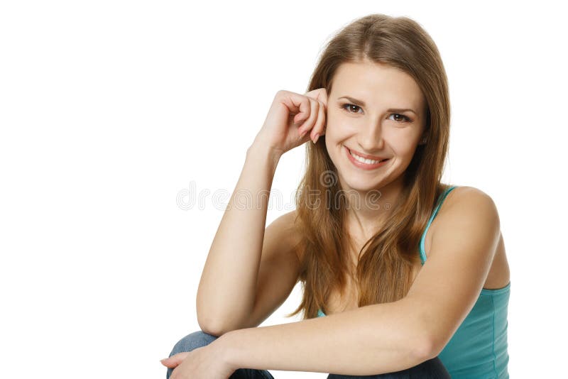 Retrato de una sentada de la mujer bastante joven fotografía de archivo Retrato de una sentada de la mujer bastante joven fotografía de archivo