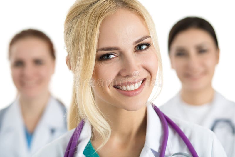 Retrato del doctor de sexo femenino rodeado por el equipo médico fotografía de archivo Retrato del doctor de sexo femenino rodeado por el equipo médico fotografía de archivo
