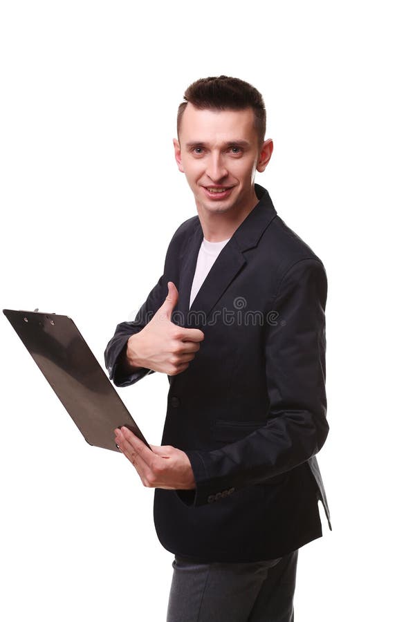 Retrato del hombre de entrega feliz que gesticula los pulgares para arriba mientras que muestra fotos de archivo Retrato del hombre de entrega feliz que gesticula los pulgares para arriba mientras que muestra fotos de archivo