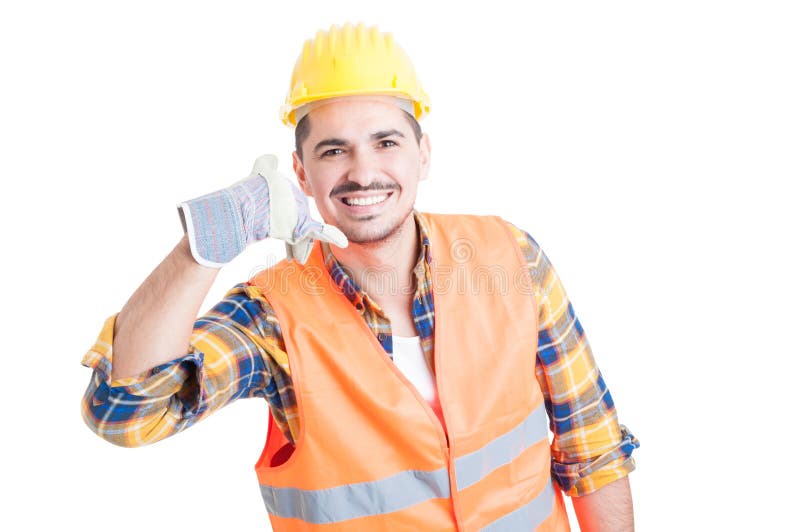 Retrato del ingeniero sonriente feliz que hace llamando usted gesticula fotos de archivo Retrato del ingeniero sonriente feliz que hace llamando usted gesticula fotos de archivo