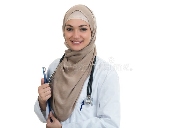 Retrato del primer del doctor de sexo femenino musulmán confiado amistoso, sonriente que celebra éxito fotografía de archivo libre de regalías Retrato del primer del doctor de sexo femenino musulmán confiado amistoso, sonriente que celebra éxito fotografía de archivo libre de regalías