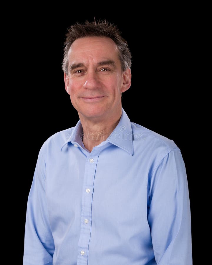 Retrato do homem de negócio de sorriso considerável na camisa azul foto de stock Retrato do homem de negócio de sorriso considerável na camisa azul foto de stock