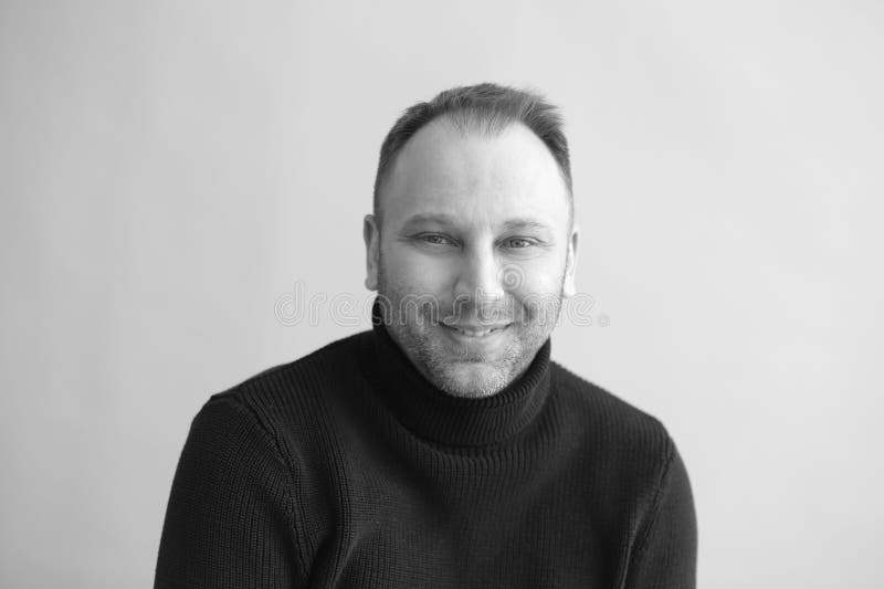 Black and white portrait of mature man in the middle of his 40s. Black and white portrait of mature man in the middle of his 40s