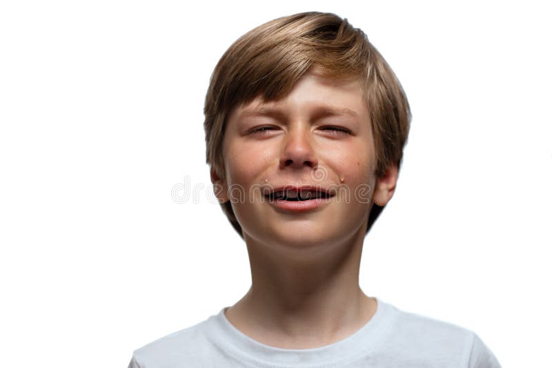 Portrait of crying eight-year-old boy isolated on a white background. Portrait of crying eight-year-old boy isolated on a white background