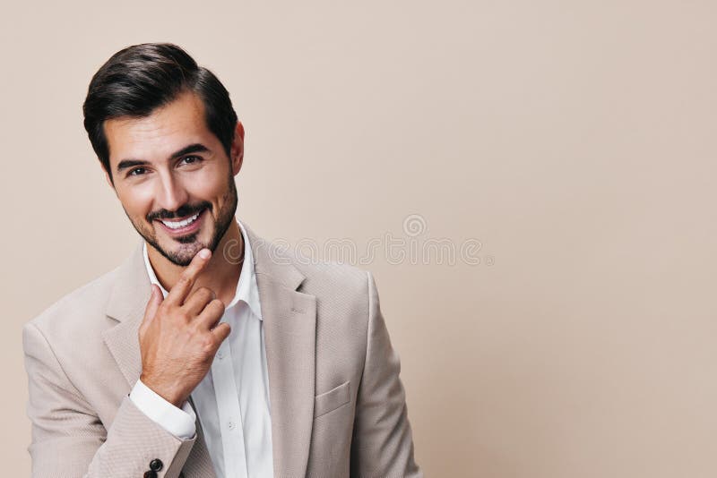 Retrato hombre de derechos de autor traje de negocios hombre de negocios sonrisa sonriente feliz beige apuesto fotos de archivo
