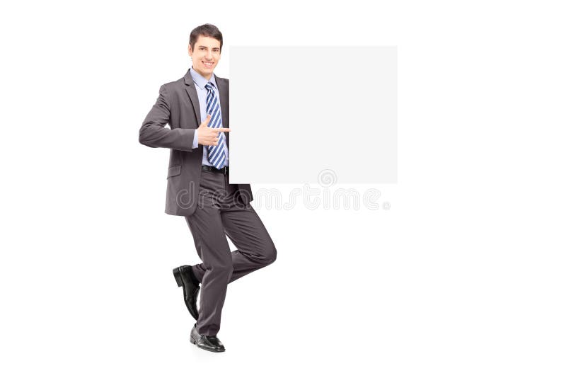 Retrato integral de un hombre de negocios joven que sostiene un panel fotos de archivo Retrato integral de un hombre de negocios joven que sostiene un panel fotos de archivo