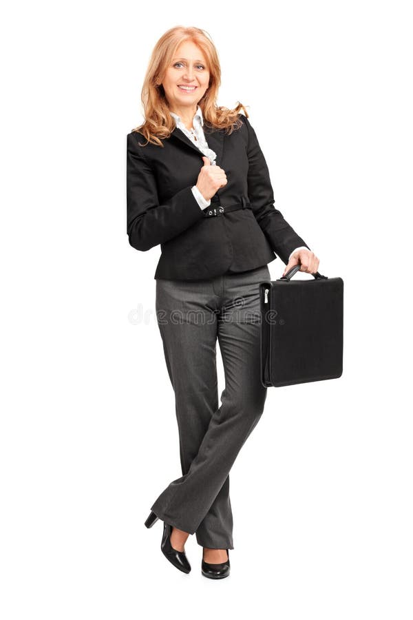 Retrato integral de una empresaria madura que se inclina contra a fotografía de archivo Retrato integral de una empresaria madura que se inclina contra a fotografía de archivo
