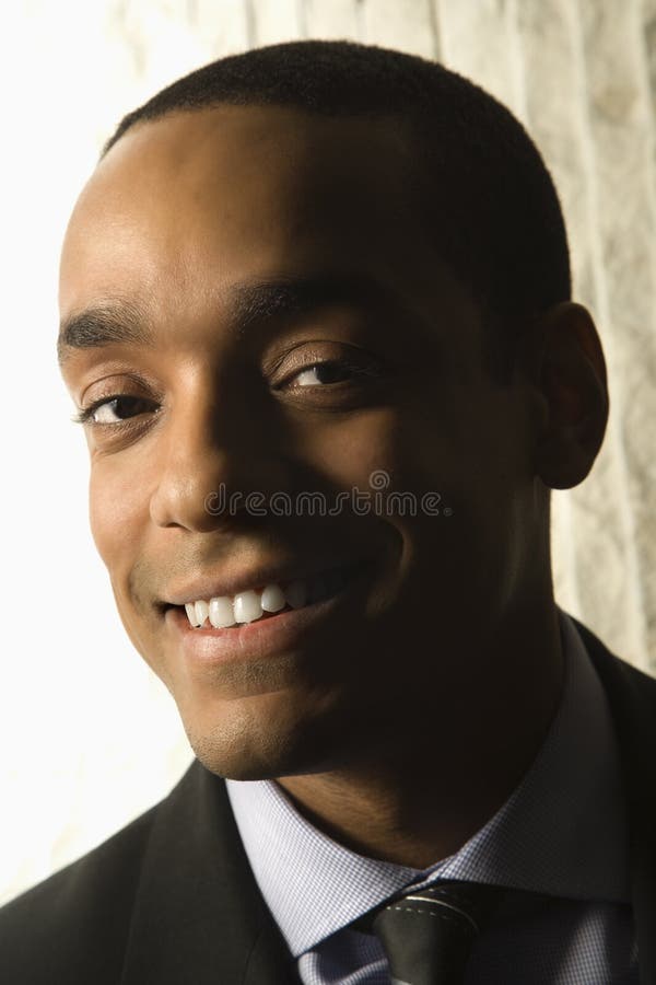 Retrato sonriente del hombre de negocios foto de archivo libre de regalías Retrato sonriente del hombre de negocios foto de archivo libre de regalías