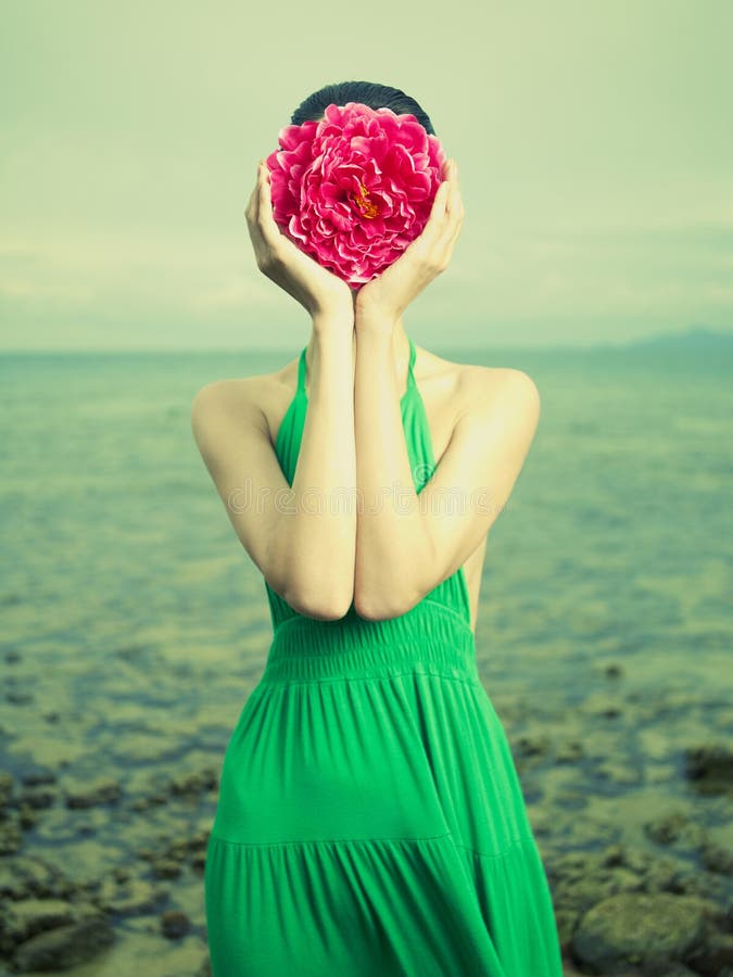 Surreal portrait of a woman with a flower instead of a face. Surreal portrait of a woman with a flower instead of a face