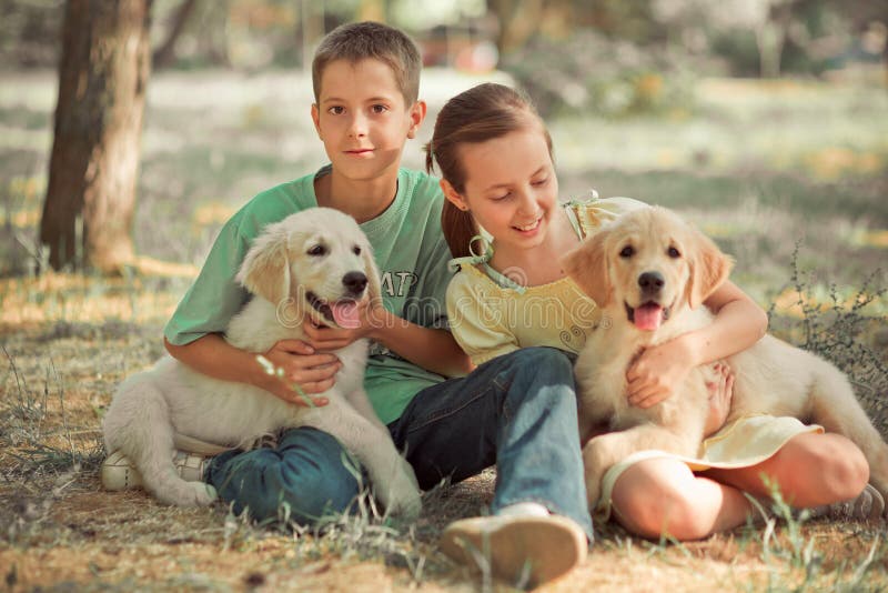 Retriever pup Lovely scene young teen sister brother enjoy posing summer time vacation with best friend dog ivory white labrador p royalty free stock photo Retriever pup Lovely scene young teen sister brother enjoy posing summer time vacation with best friend dog ivory white labrador p royalty free stock photo