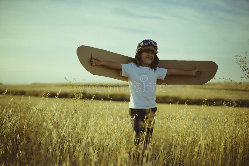 Retro, Boy playing to be airplane pilot, funny guy with aviator