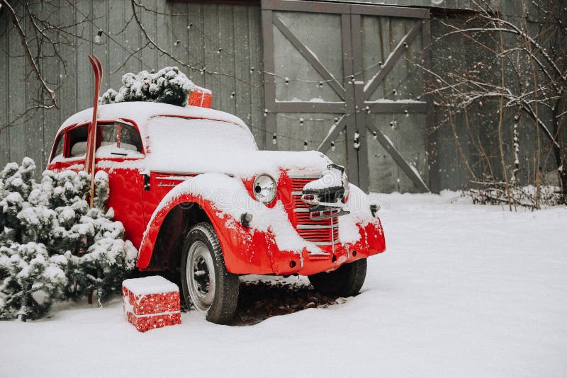 Retro car red outside winter decorated christmas