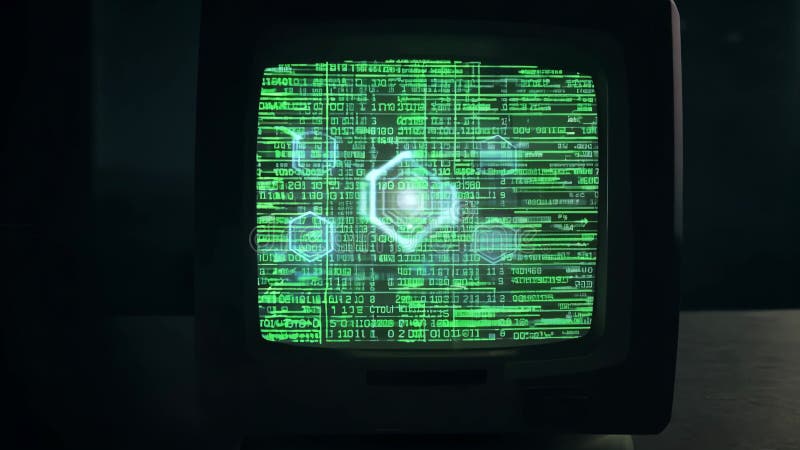 A retro computer monitor displays green code in a dark room, evoking classic hacker aesthetics. 4k Video footage royalty free illustration