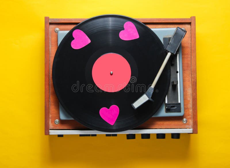 Retro culture, Valentine&x27;s Day. Decorative hearts on a vinyl record plate