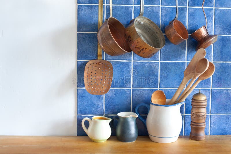 Retro Design Kitchen Interior with Accessories. Hanging Copper Kitchenware Set Stock Photo