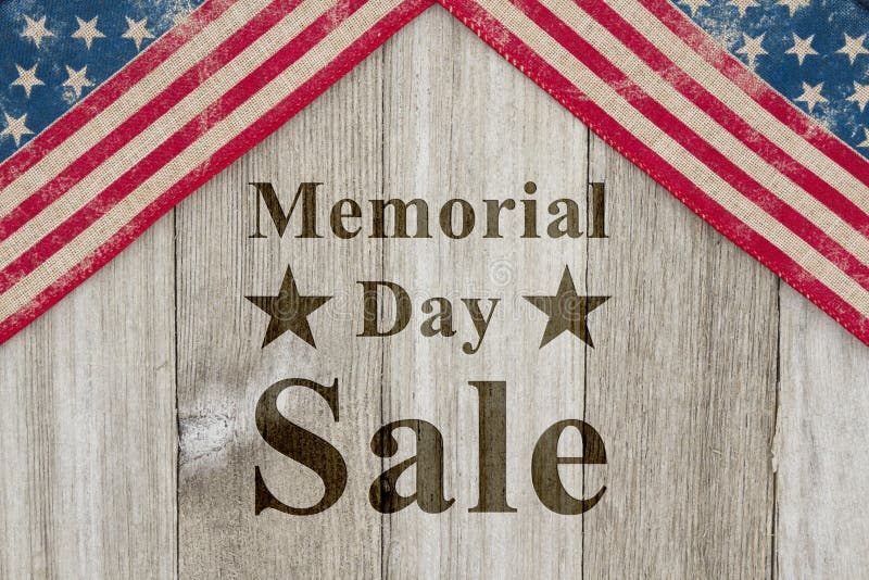 Memorial Day sale message, USA patriotic old flag on a weathered wood background with text Memorial Day Sale. Memorial Day sale message, USA patriotic old flag on a weathered wood background with text Memorial Day Sale