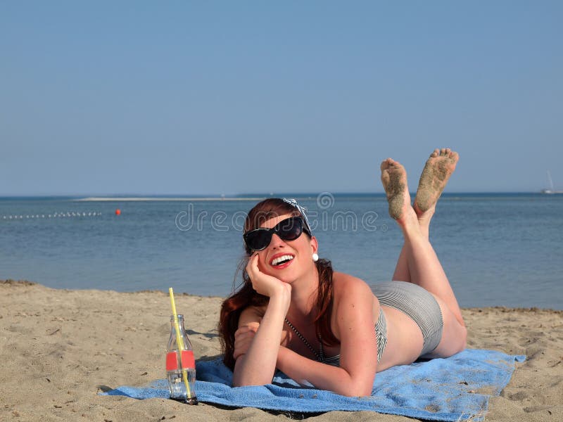 Retro girl at the beach