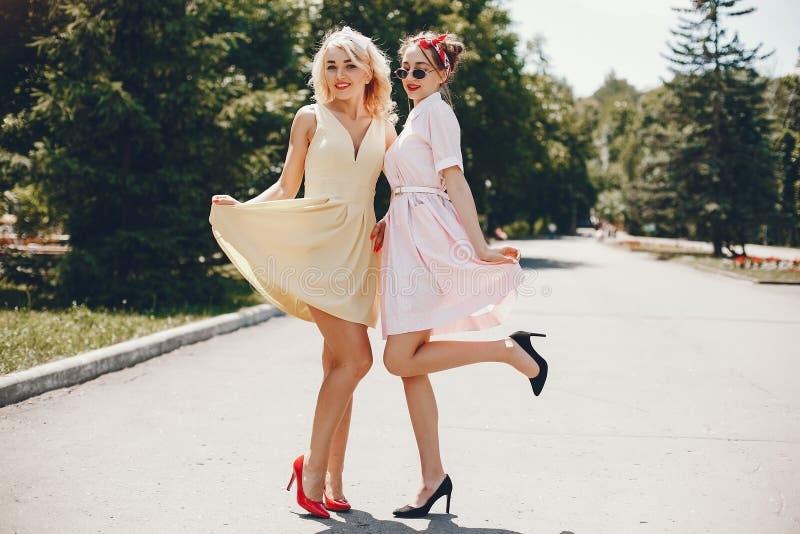 Retro girls in a park stock image. Image of cute, happy - 167339615