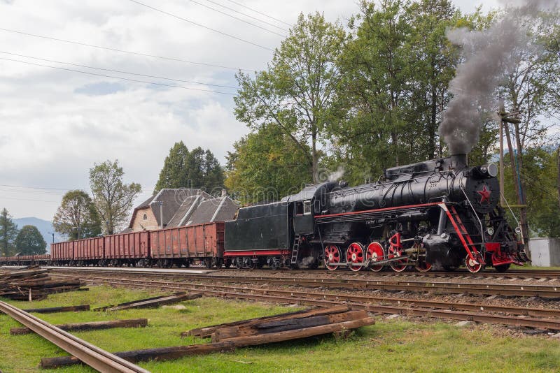 Retro locomotive with freight cars royalty free stock photo Retro locomotive with freight cars royalty free stock photo