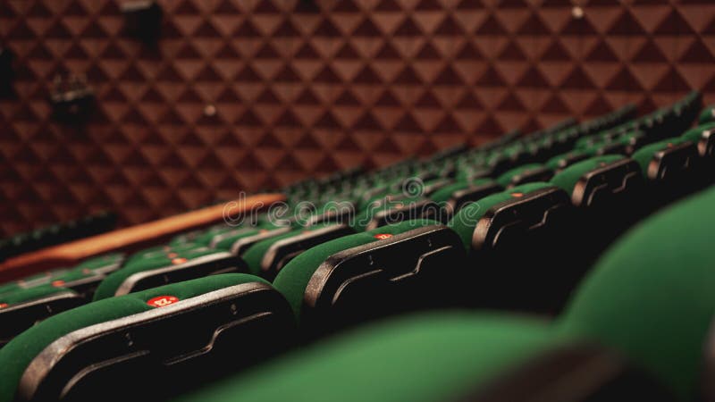 Retro- setzende Sitze des Weinlesekinotheaterfilm-Publikums, Grün, niemand lizenzfreies stockfoto Retro- setzende Sitze des Weinlesekinotheaterfilm-Publikums, Grün, niemand lizenzfreies stockfoto