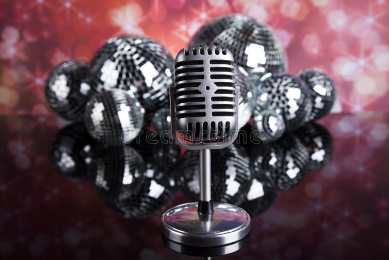 Retro Style Microphone on Sound Waves and Disco Balls Stock Image