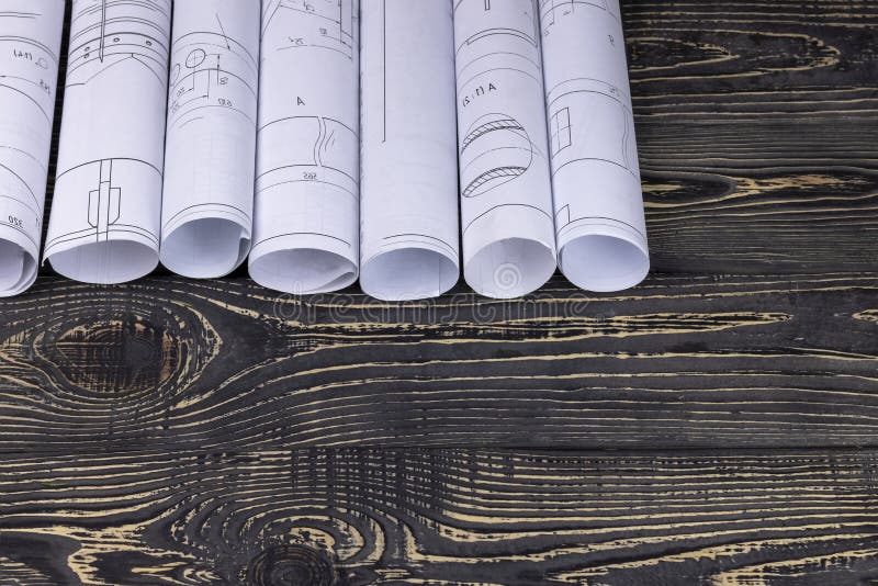 Retro style wooden background. many projects, drawing, and a small house royalty free stock photo