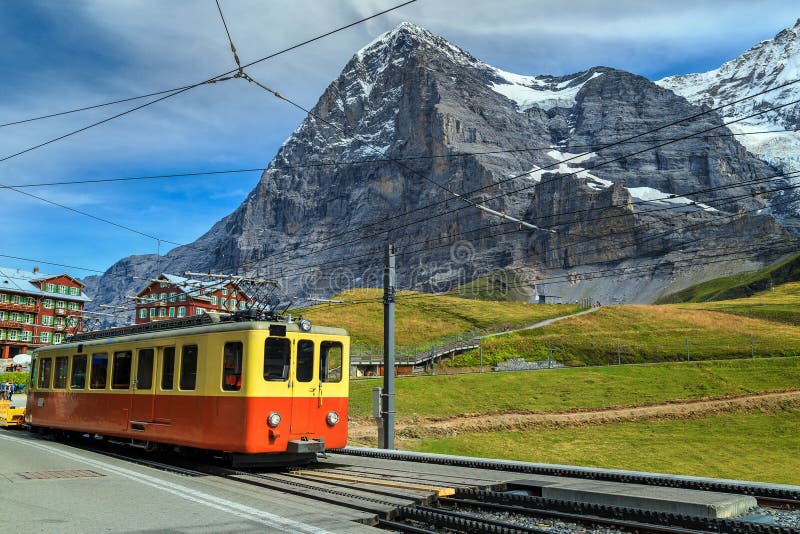 Retro tourist train and Eiger North face, Bernese Oberland, Switzerland