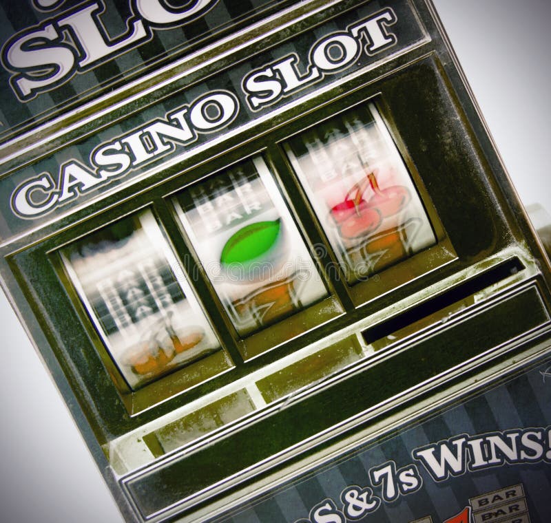Retro toy slot machine spinning to win