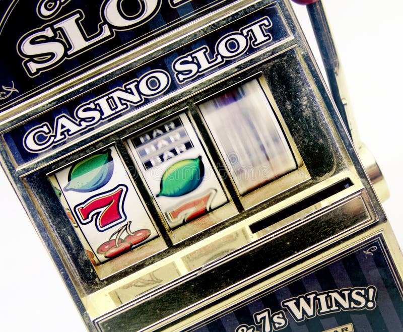 Retro toy slot machine spinning to win