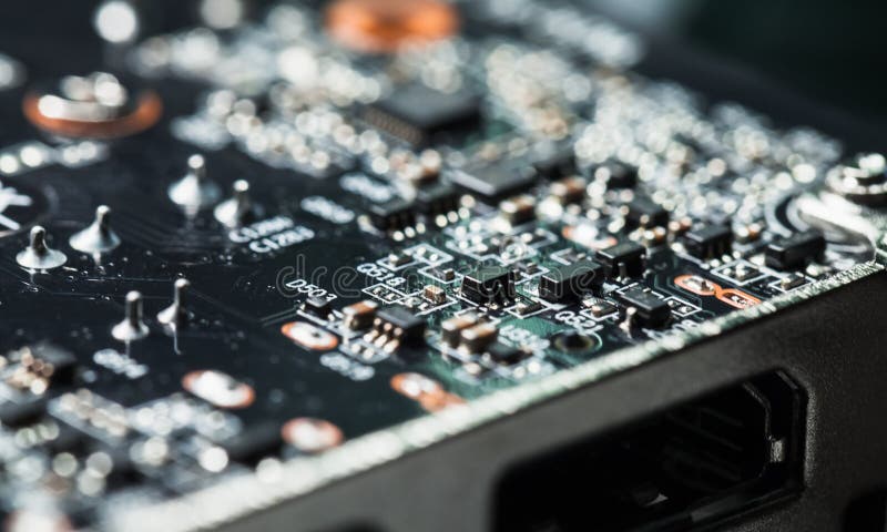 Retroterra astratto ad alta tecnologia con scheda a circuito stampato microelettronica fotografia stock