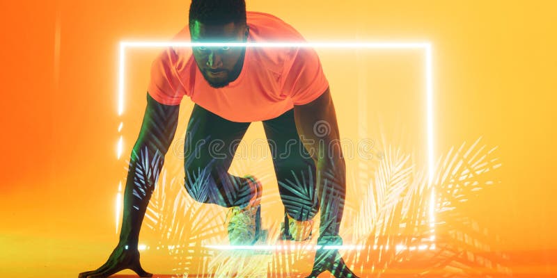 Retângulo iluminado e plantas sobre o atleta masculino africano na posição inicial fotografia de stock royalty free