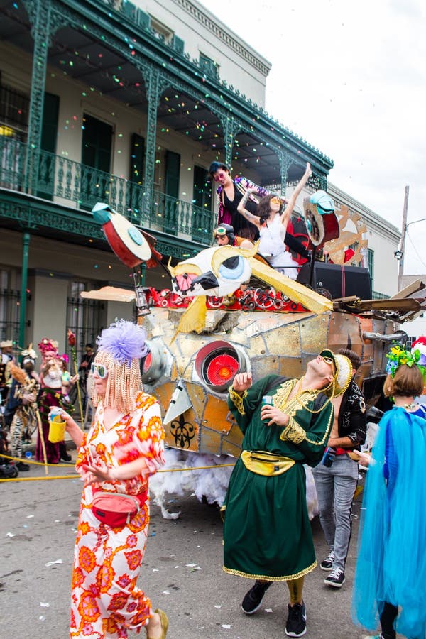 Revelers Riding a Float in the St Anne Walking Parade on Mardi Gras Day