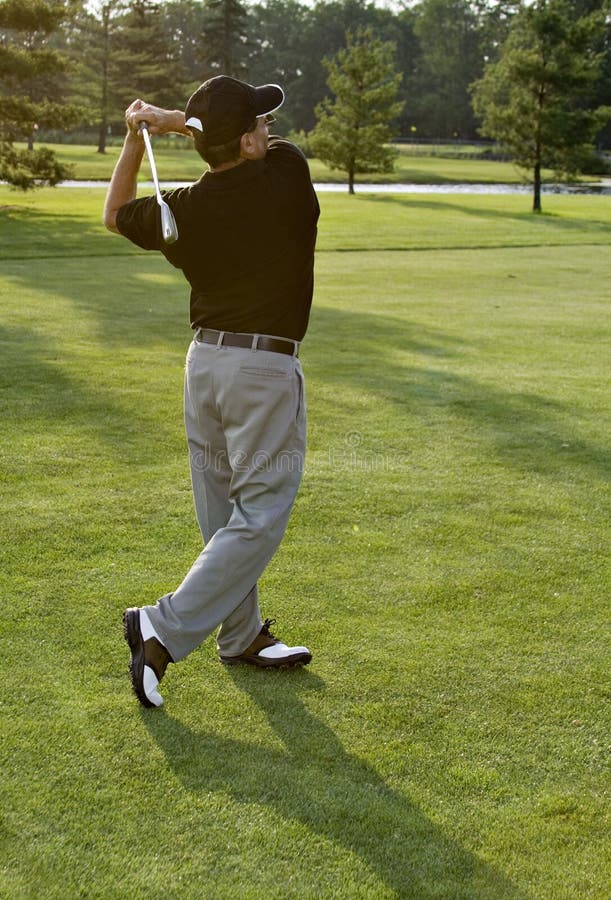 Review Golf Swing stock image. Image of season, green, drive 937375