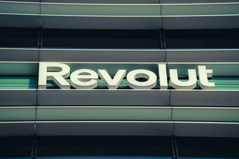 Revolut company logo signboard on modern office building in Vilnius, Lithuania on November 09, 2022. Revolut is British