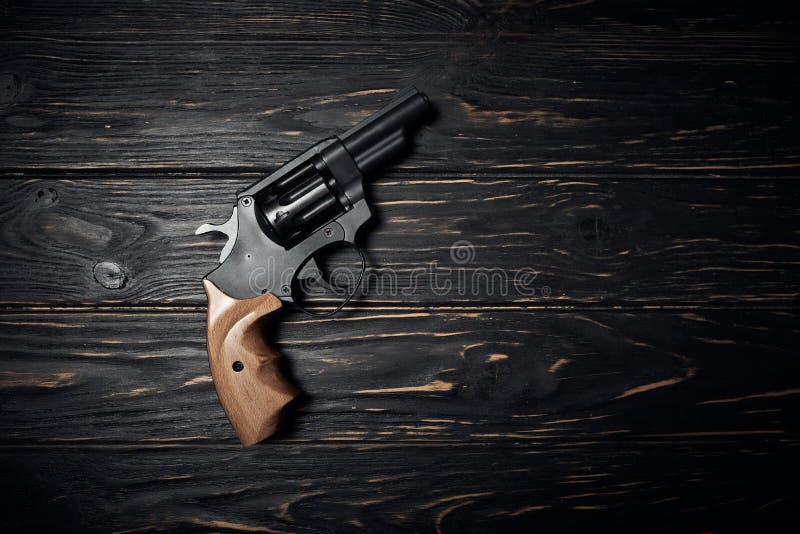 Revolver Cylinder With One Flobert Ammo 4mm On Dark Wooden Background Russian  Roulette Concept Stock Photo - Download Image Now - iStock