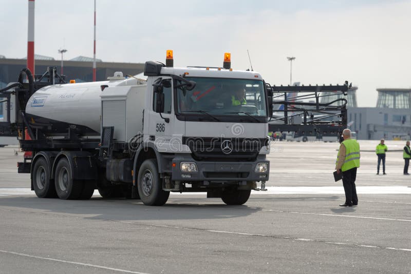 St. Petersburg, Russia - September 24, 2015: Schmidt airport sprayer during the annual review of equipment in the Pulkovo airport. The review is held in order to prepare to winter. St. Petersburg, Russia - September 24, 2015: Schmidt airport sprayer during the annual review of equipment in the Pulkovo airport. The review is held in order to prepare to winter