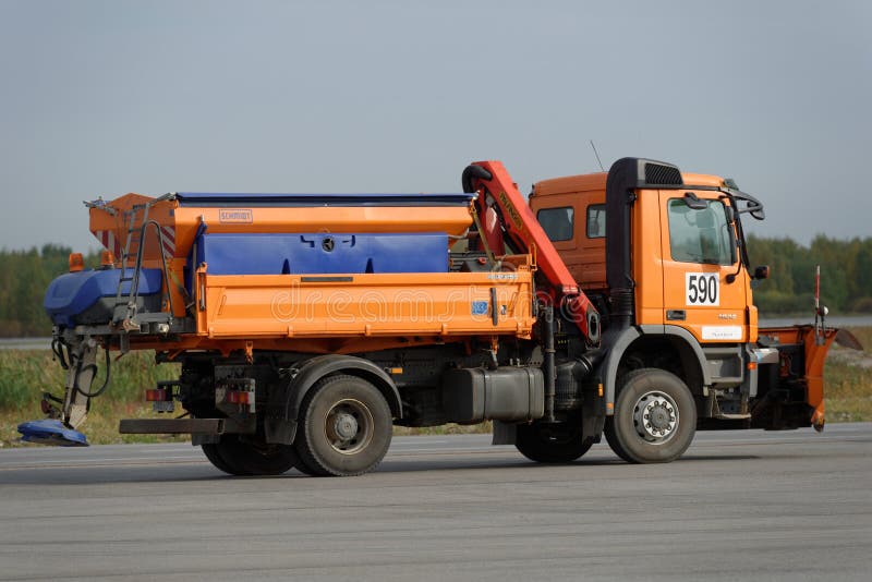 St. Petersburg, Russia - September 24, 2015: Snow removal vehicle during the annual review of equipment in the Pulkovo airport. The review is held in order to prepare to winter. St. Petersburg, Russia - September 24, 2015: Snow removal vehicle during the annual review of equipment in the Pulkovo airport. The review is held in order to prepare to winter