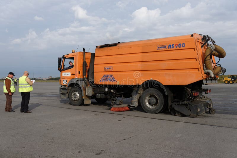 St. Petersburg, Russia - September 24, 2015: Airport sweeper AS 900 of Schmidt during the annual review of equipment in the Pulkovo airport. The review is held in order to prepare to winter. St. Petersburg, Russia - September 24, 2015: Airport sweeper AS 900 of Schmidt during the annual review of equipment in the Pulkovo airport. The review is held in order to prepare to winter