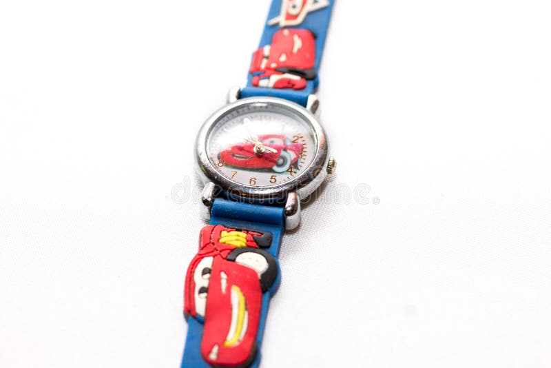 Blue-and-red kids watch cartoon cars with toy cars on a white background. Blue-and-red kids watch cartoon cars with toy cars on a white background