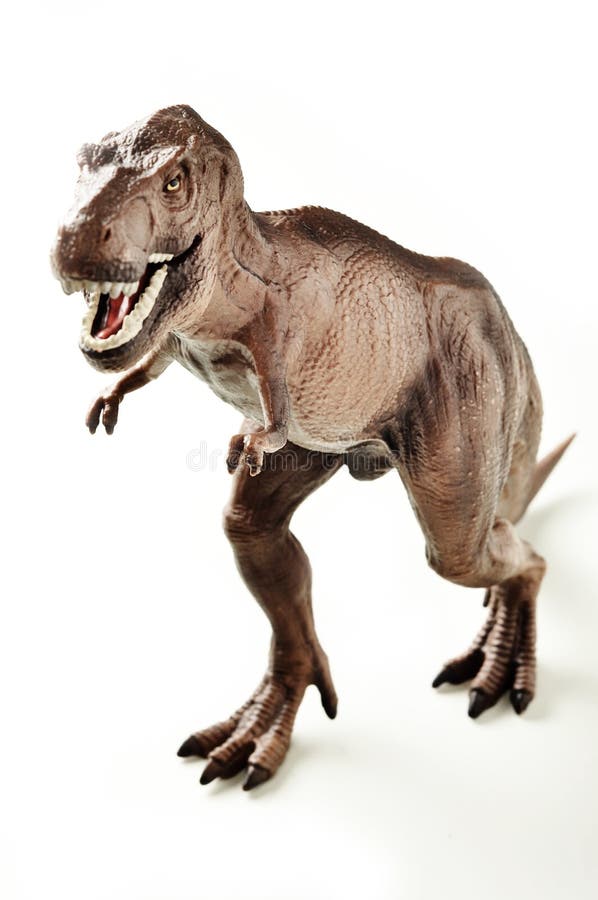 A statue of a tyrannosaurus rex (toy). A statue of a tyrannosaurus rex (toy)