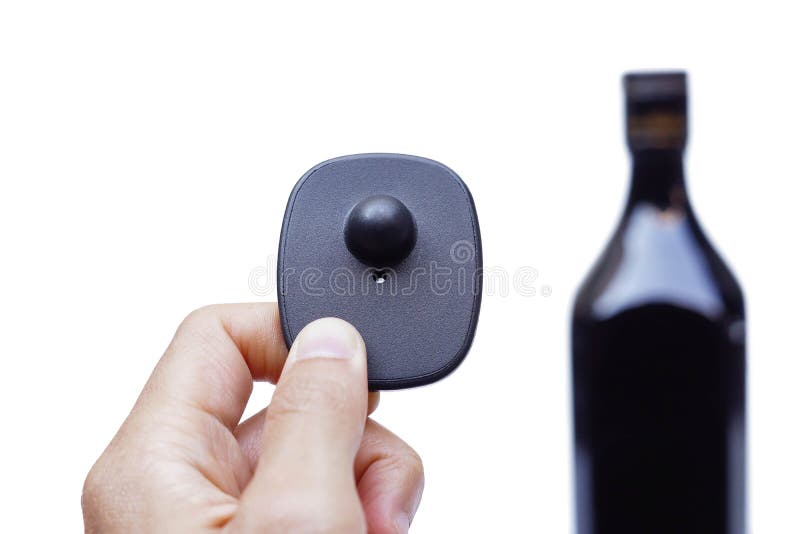 RFID hard tag for alcoholic drinks royalty free stock photo