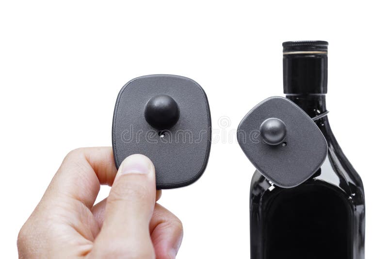 RFID hard tag for alcoholic drinks stock photography