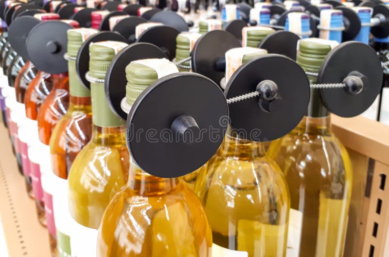 RFID hard tag on alcoholic drinks bottle stock images