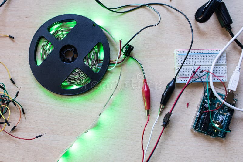 RGB led strip addressable controlled by a microcontroller open source to have green color flux. Maker project for DIY environment lighting. Lights for wearable. RGB led strip addressable controlled by a microcontroller open source to have green color flux. Maker project for DIY environment lighting. Lights for wearable