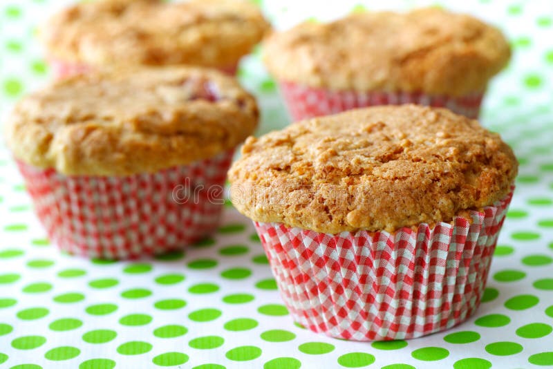 Rhubarb muffins freshly baked in red cups. Dessert portions stock images, royalty-free photos and pictures